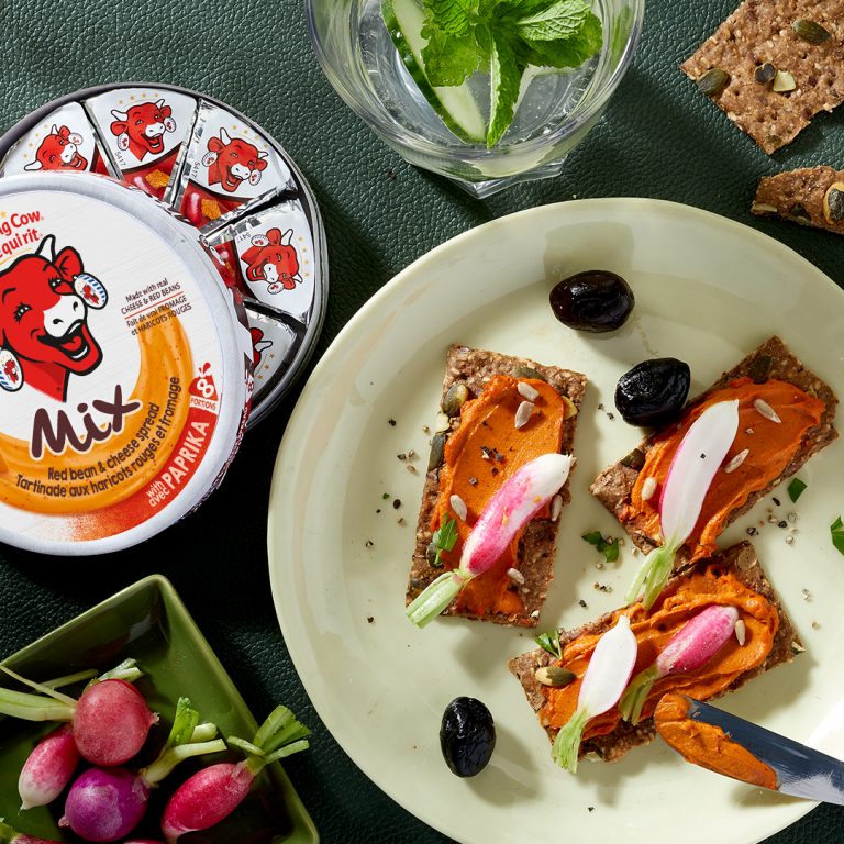 Crackers with The Laughing Cow® Mix Red Beans with Paprika, Radishes and Black Olives